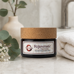 Rejuvenate face cream on a spa vanity with botanicals