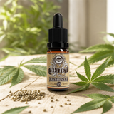 Whitey 14% CBGa oil with fresh hemp leaves